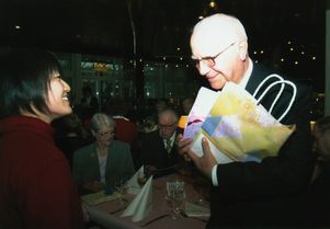 A choir member meets the descendant of a former German POW